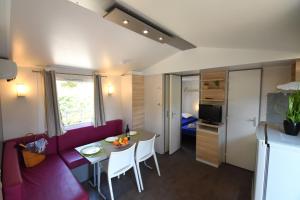 Campings CAMPING & SPA CAP SOLEIL : photos des chambres