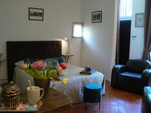 Appartements Logis Muraille Romaine, Centre Historique, Lit queen size : photos des chambres