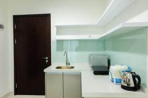 Simply and Relax 1BR at Brooklyn Alam Sutera Apartment By Travelio