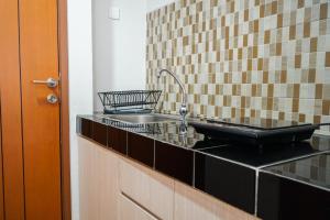 Modern Studio Apartment at Margonda Residence 5 By Travelio