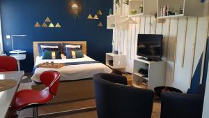 Appartements Studio Bleu - Parc Asterix - Mer de Sable - Villepinte - Aeroport CDG : photos des chambres