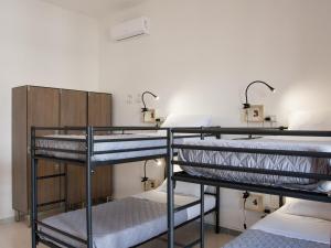 Bed in 6-Bed Mixed Dormitory Room room in Lobby Collective Hostel - Lecce