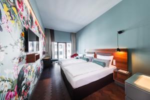 Triple Room room in Maison Schiller by DesignCity Hotels