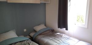 Campings Les Acacias : photos des chambres