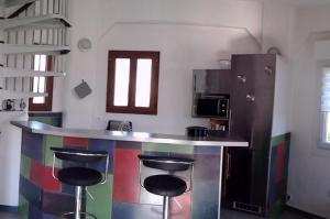 Maisons de vacances Chateau d'eau reamenage en Maison ronde proche de la plage et du Castellet : photos des chambres