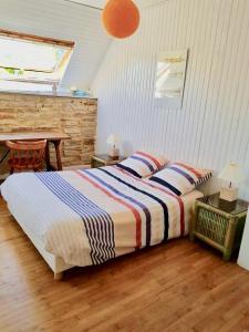 Maisons de vacances LE FOUESNANT - Maison agreable 8 personnes avec jardin : photos des chambres