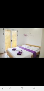 Two-Bedroom Apartment with Balcony and Partial Sea View room in Holiday Apartments & Rooms