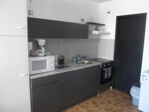 Appartements Studio sur le port, climatisation, wifi, piscine, lave-linge : photos des chambres