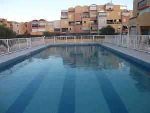 Appartements Studio sur le port, climatisation, wifi, piscine, lave-linge : photos des chambres