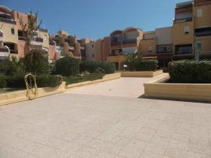 Appartements Studio sur le port, climatisation, wifi, piscine, lave-linge : photos des chambres