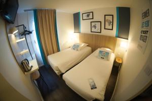 Hotels Kyriad Hotel La Fleche : photos des chambres