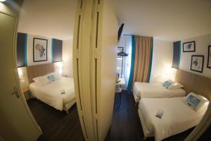 Hotels Kyriad Hotel La Fleche : photos des chambres