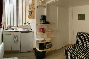 Appartements Maisonnette studio sur cour : Studio