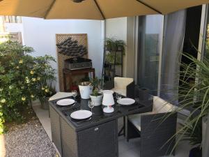 Appartements Villa Marcenac 45 m2, jardin, parking, wifi, netflix : photos des chambres