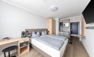 Double Room with Balcony and Kitchen room in centerroom München City