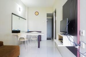 Pool View 2BR at Dian Regency Apartment By Travelio