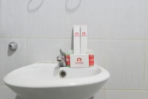 Pool View 2BR at Dian Regency Apartment By Travelio