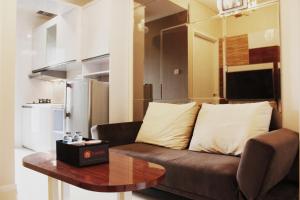 Fabulous 1BR Apartment Parahyangan Residence By Travelio