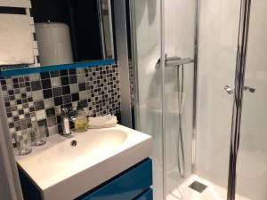 Appartements le 31 Au Coeur des Places : photos des chambres
