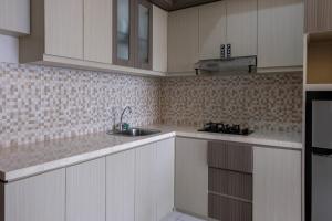 Cozy 1BR at Casa De Parco Apartment By Travelio