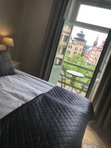 Superior Double Room with Balcony - King Bed room in Hotell Göta