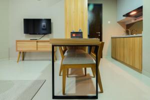 Best Location 1BR Apartment Mustika Golf Residence By Travelio