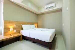 Best Location 1BR Apartment Mustika Golf Residence By Travelio - Pegadungan