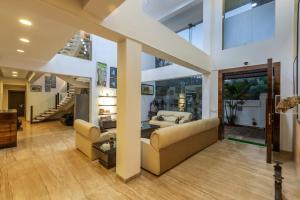 SaffronStays Vedanta - 5BR luxury villa with plunge pool, game zone, lawn & Tungarli Lake nearby