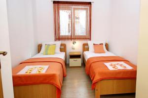 Two-Bedroom Apartment with Terrace room in Apartments by the sea Zaboric Sibenik - 468