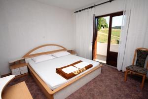 Apartments by the sea Kampor, Rab - 5051