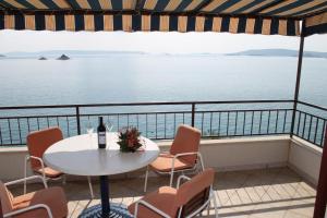 Two-Bedroom Apartment with Terrace and Sea View room in Seaside apartments with a swimming pool Seget Vranjica Trogir - 2571
