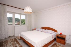 Apartments with parking space Kampor, Rab - 4984