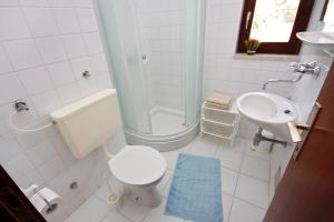 Two-Bedroom Apartment room in Apartments and rooms by the sea Seget Vranjica Trogir - 5160