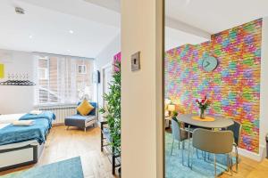 Rainbow Studio - By My Getaways
