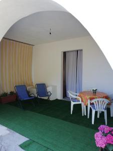 Appartement Appartamento ristrutturato in casa d'epoca eoliana Leni Italië