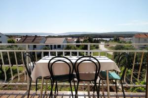 Two-Bedroom Apartment with Balcony and Sea View room in Apartments with a parking space Punat Krk - 5410