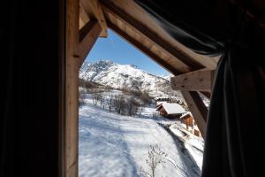 Chalets Maison Puy Saint Vincent : photos des chambres