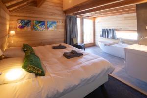 Chalets Maison Puy Saint Vincent : photos des chambres