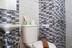 Comfy 2BR Apartment at Grand Asia Afrika By Travelio