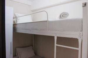 Comfy 2BR Apartment at Grand Asia Afrika By Travelio