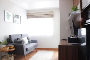 Comfy 2BR Apartment at Grand Asia Afrika By Travelio