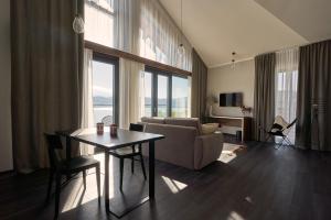 Master Suite Plus with a view on the lake and mountains room in Lake Hill Resort & Spa