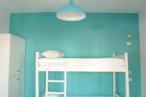 Quadruple Room with Garden View room in Bed Station Hostel & Bar