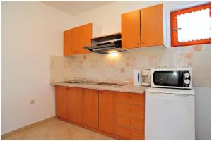 Two-Bedroom Apartment with Terrace room in Family friendly apartments with a swimming pool Vir - Lozice Vir - 13569
