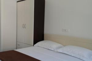 Two-Bedroom Apartment with Terrace and Sea View room in Apartments by the sea Bilo Primosten - 14601