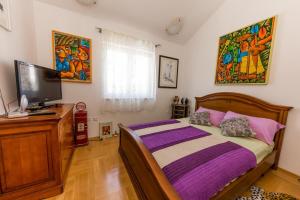 Two-Bedroom Apartment with Terrace and Sea View room in Apartments by the sea Arbanija Ciovo - 14825