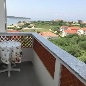 Apartments by the sea Banjol, Rab - 15679