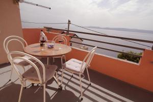 Apartments by the sea Pisak, Omis - 12545