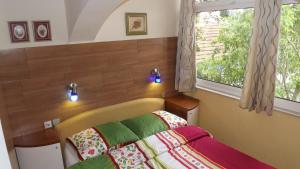 Two-Bedroom Apartment with Terrace room in Apartments by the sea Zadar - Diklo Zadar - 12854