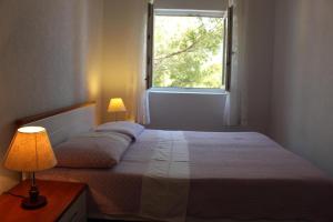 Apartments by the sea Sveta Nedilja, Hvar - 13176